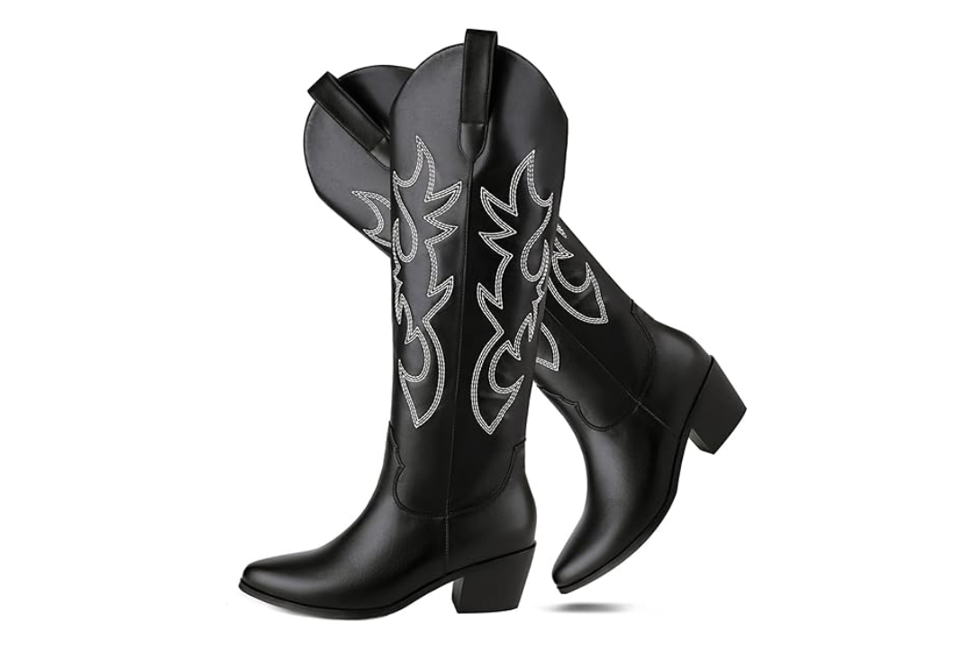 Black knee-high western boots with white embroidery and low block heel.